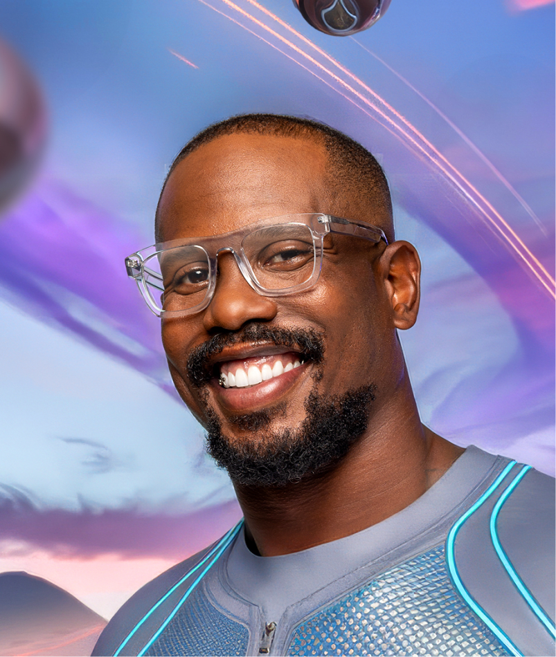 Von Miller wearing transparent-style glasses from the GlassesUSA collection in a vibrant futuristic scene