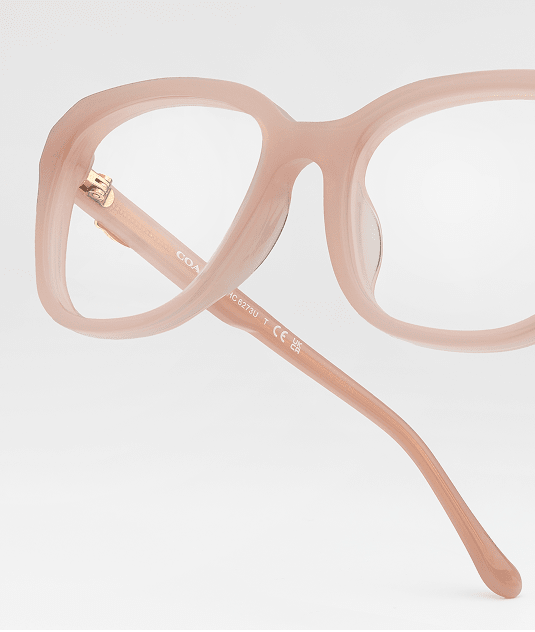 Coach GlassesUSA Frame With a Soft milky pink hue