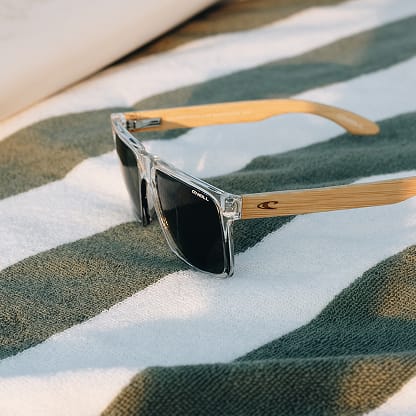 Prescription-eligible O’Neill x GlassesUSA.com Harwood 2.0 clear frame polarized sunglasses.