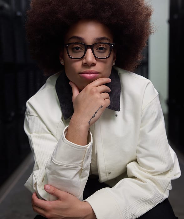 Olivia Miles wearing glassesUSA Muse Toppin glasses