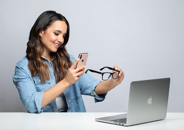 Woman scans glasses