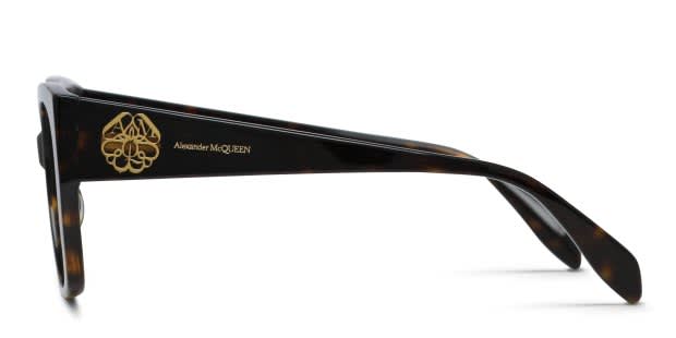 The Alexander McQueen AM0379O is a squared cat-eye frame with a