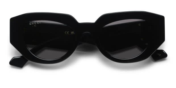 The Gucci GG1421S is a stylishly chunky sunglasses frame exuding