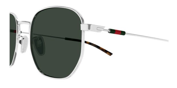 Gucci GG2095S silver frame with green lenses. Lenses provide 100
