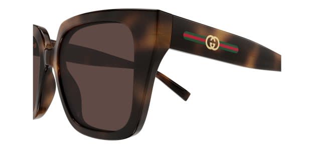 Gucci GG2102S tortoise frame with brown lenses. Lenses provide 100