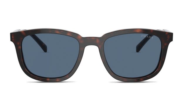 Prada PRA21S tortoise frame with dark blue lenses. Lenses provide