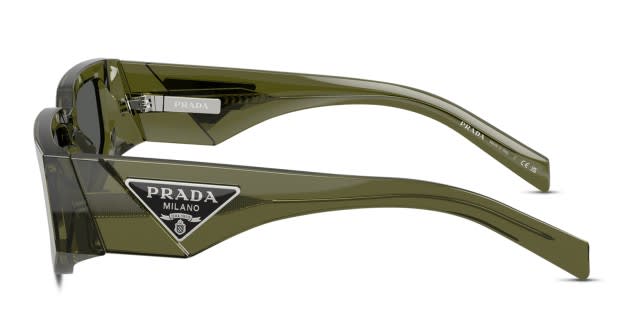 Prada PR09ZS clear , green frame with dark grey lenses. Lenses provide 100%  UV protection.