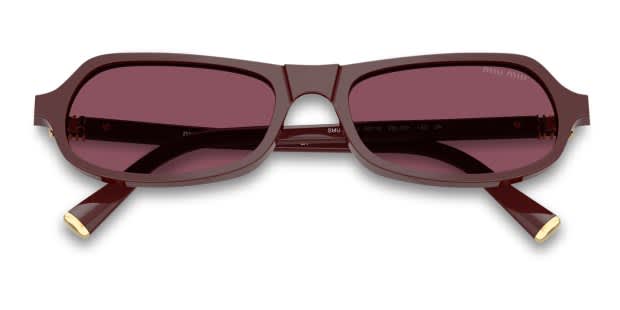 Miu Miu MUB10SU red frame with dark violet lenses. Lenses provide