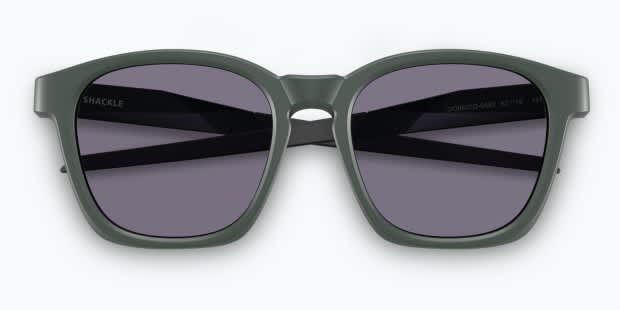 Oakley OO9507D Shackle green frame with PRIZM grey lenses. Lenses