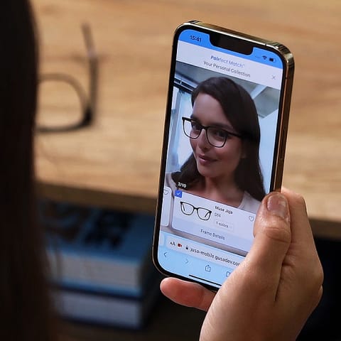 Woman using virtual try-on feature on her phone