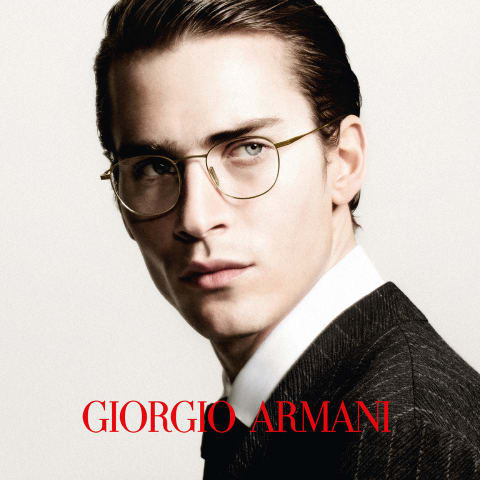 Man in Giorgio Armani glasses exuding timeless elegance