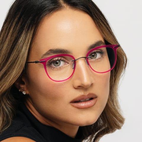 Woman wearing bold pink Unica glasses