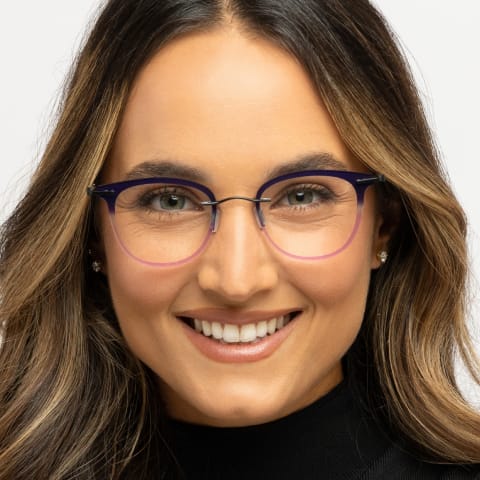 Smiling woman in violet Unica glasses